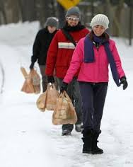 One, two, three folks help carry a strangers groceries.