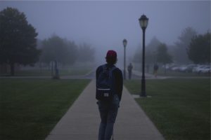 Young man emerging adult on campus